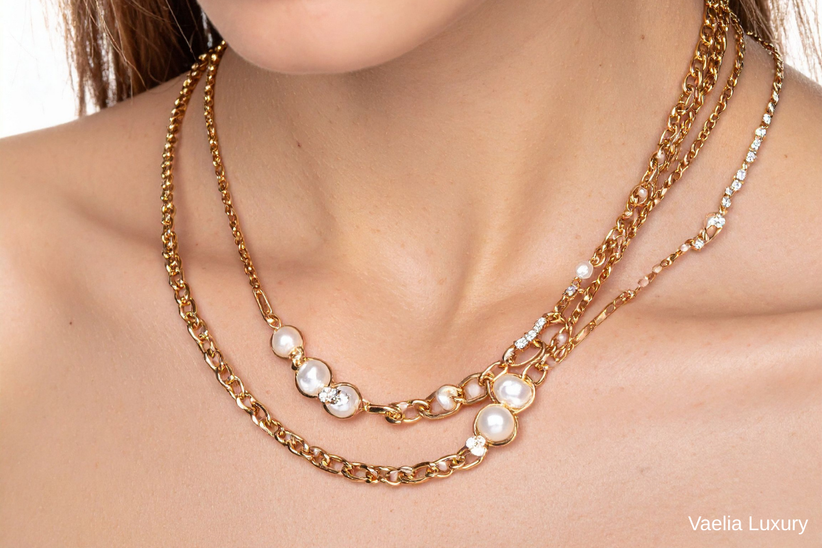 Vaelia fine jewelry collection with gold pieces, pearls and statement accessories